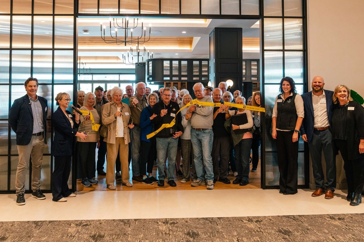 Cutting the ribbon at the depositor's brunch