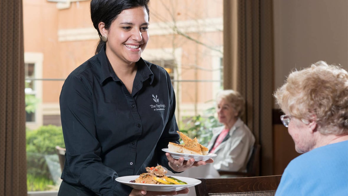 Server at The Springs Living dining hall