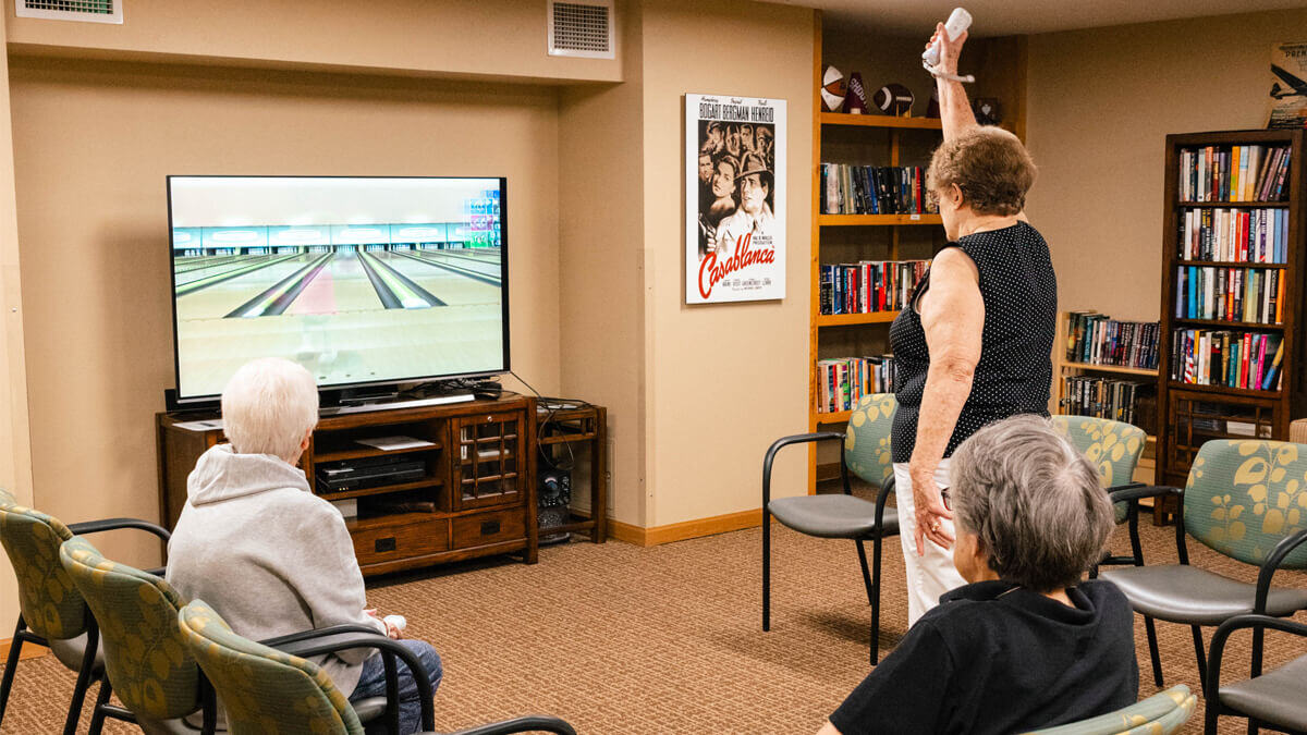 Residents playing Wii bowling at the Missoula community