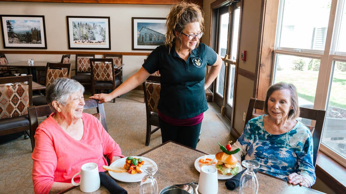 Residents dining together at the Butte community