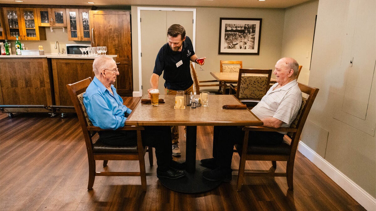 Two residents dining at the Grand Park community