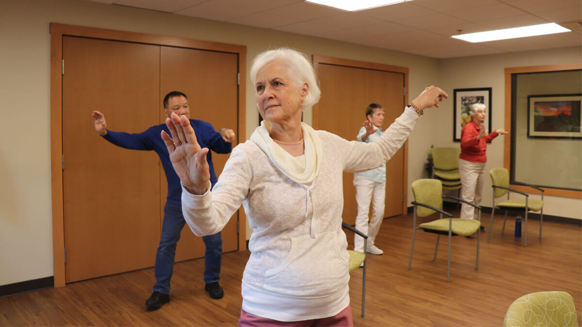 Residents exercising at the Lancaster Village community