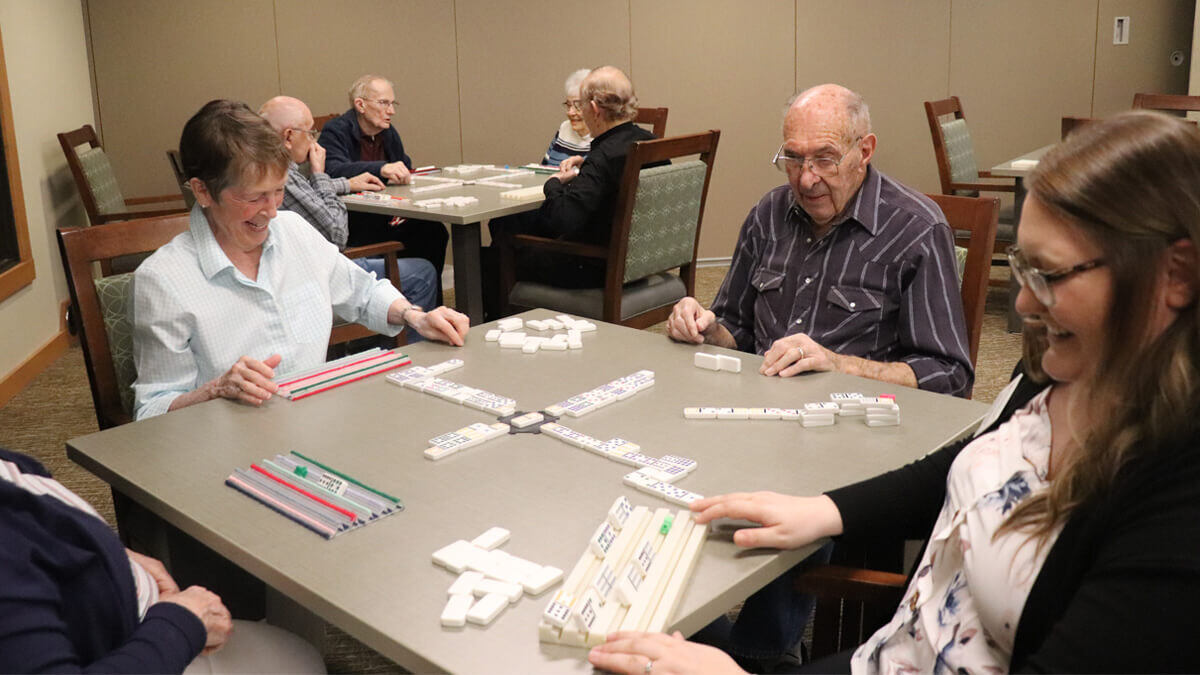 Residents playing games at the Lancaster Village community