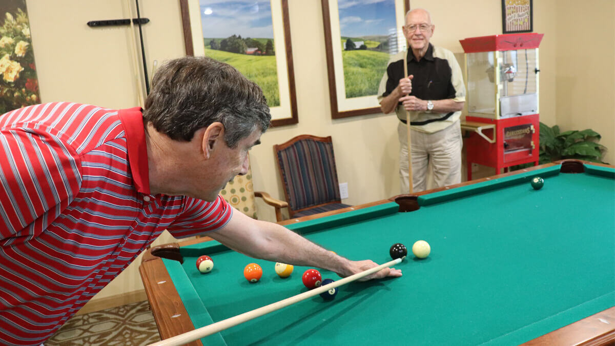 Residents playing pool at the Sunnyview community