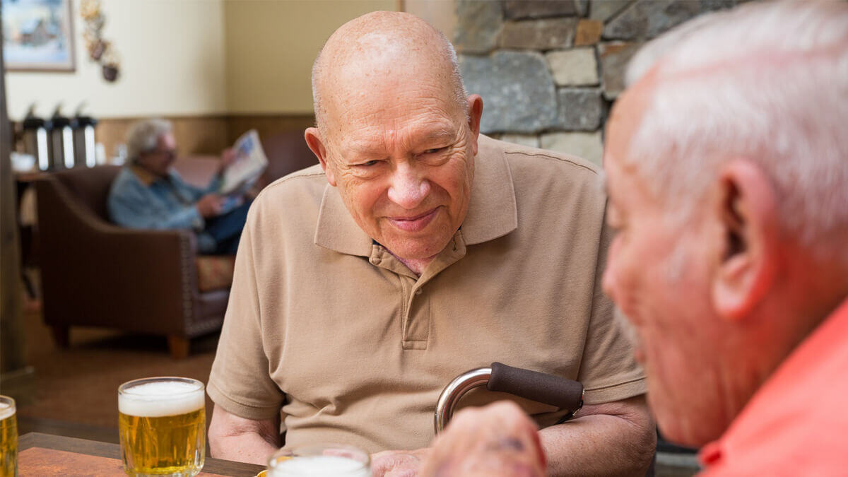 Residents enjoying drinks at the Whitefish community