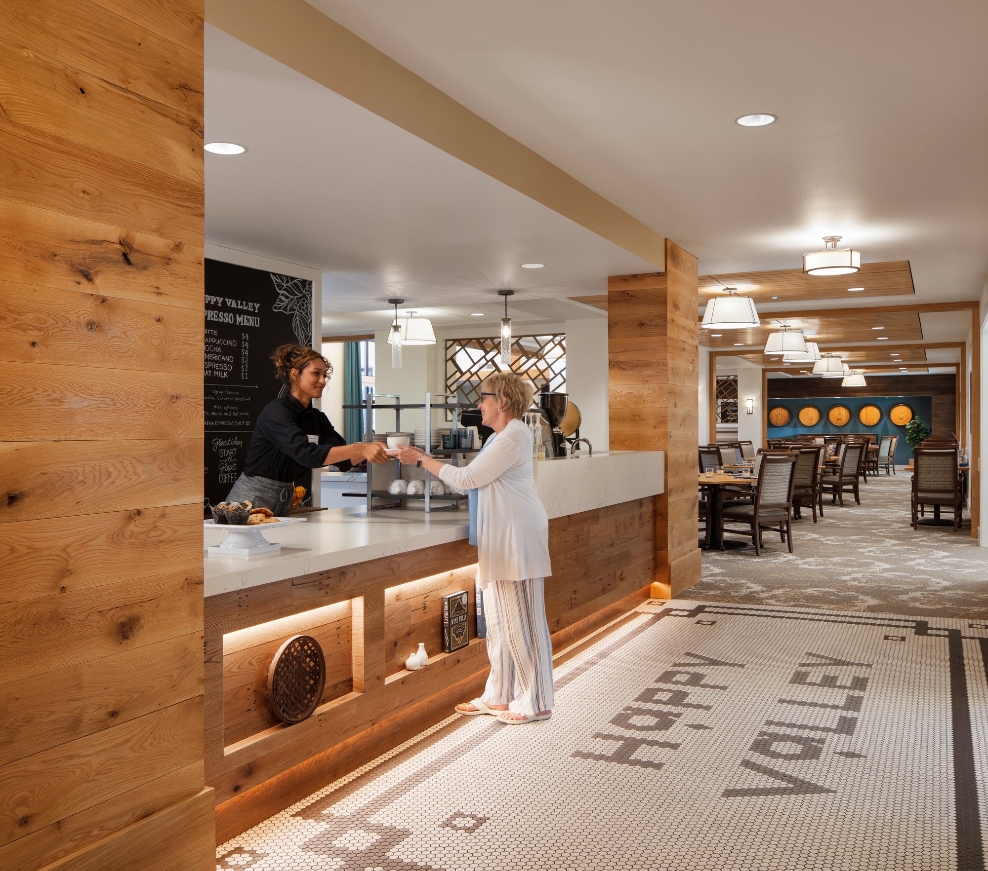 Resident ordering from the cafe at the Happy Valley community